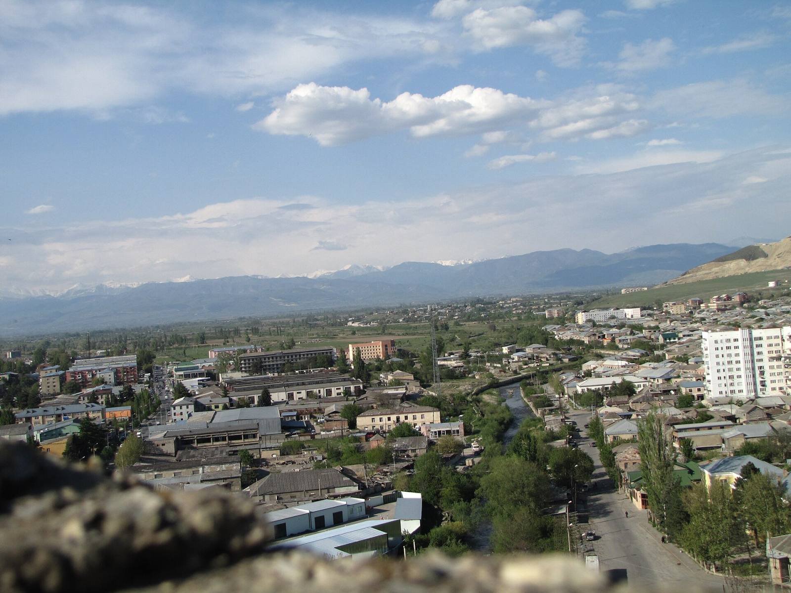 The city of Gori and the Liakhvi valley seen from the fortress, with mountains on the horizon