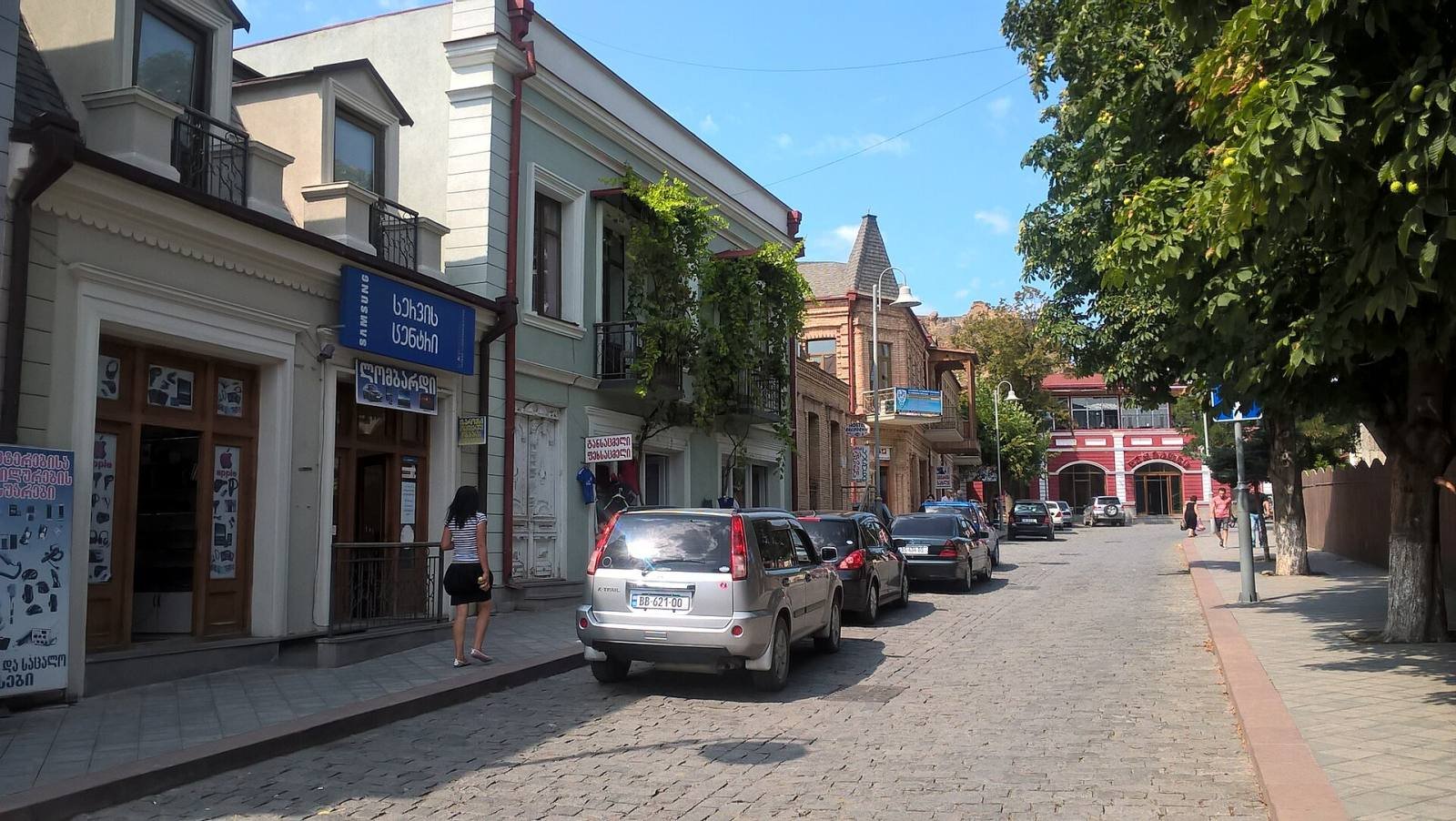 A quiet street of restored two-storey houses with balconies in the centre of Gori