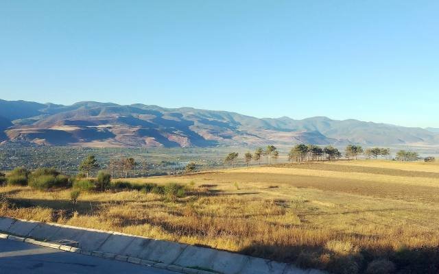 The wide Mtkvari valley and the hills of the Trialeti range on a sunny autumn day